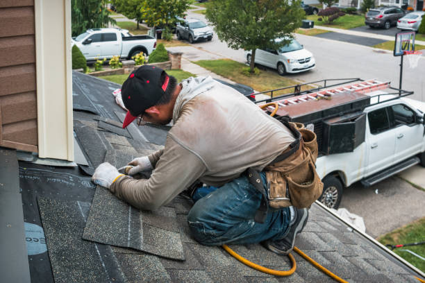 Professional Roofing technician working in New Midway, MD